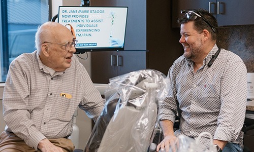 Dr. Miller having friendly conversation with senior patient