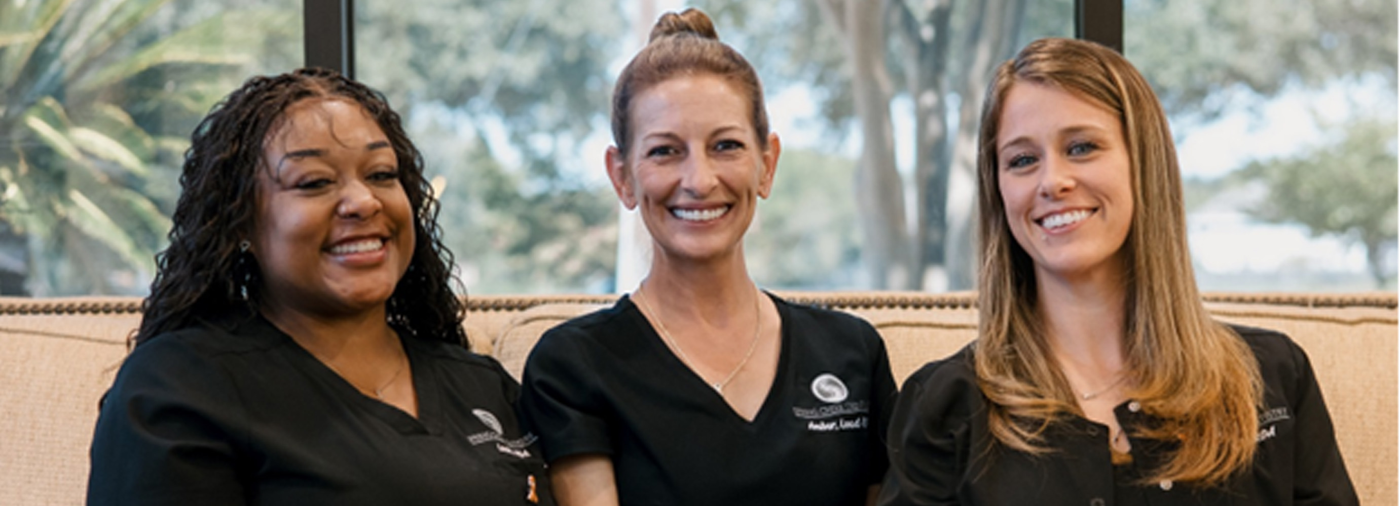 Smiling members of Spring Creek Dentistry team