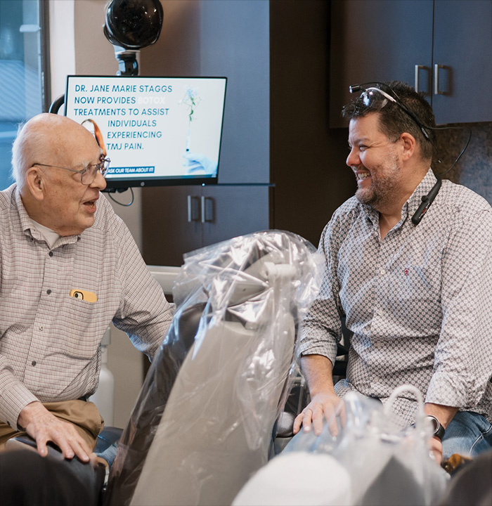 Dental team member scanning a patients teeth