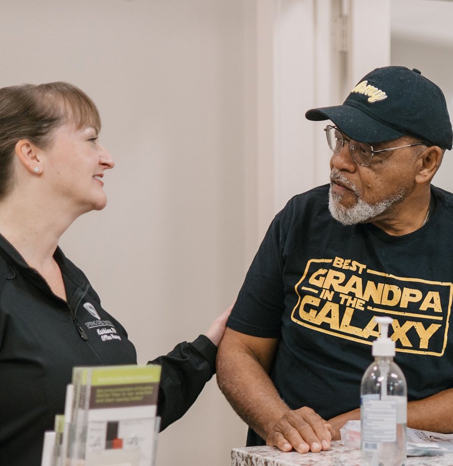 Team member interacting with patient at Spring Creek Dentistry