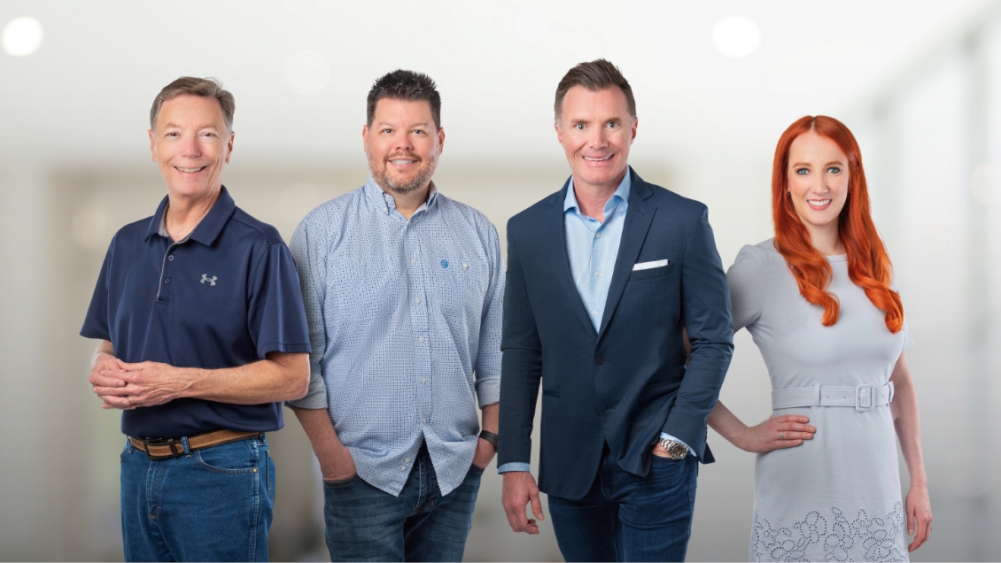 Four smiling dentists in Spring