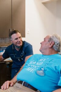 Doctor at Spring Creek Dentistry speaking with patient