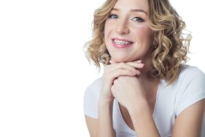 Portrait of smiling young woman with braces 